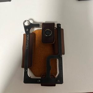 Trayvax contour wallet w/tobacco brown leather/black screws. Black leather also